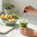 Natural wellness scene with greenhouse THCa flower tincture prominently featured in a vibrant kitchen during smoothie preparation, emphasizing organic ingredients and quality.
